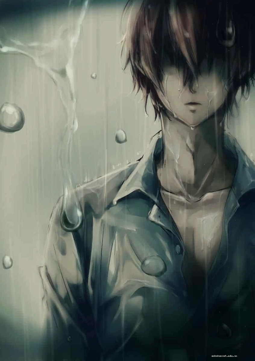 Chàng trai anime đứng một mình trong mưa buồn bã
