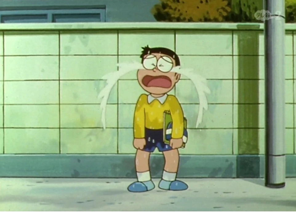 Gia đình Nobita gồm bố Nobisuke, mẹ Tamako và Doraemon